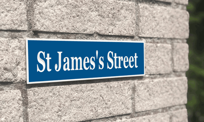 Blue house sign with street name