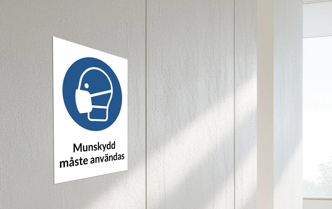Påbudsskylt med text och symbol