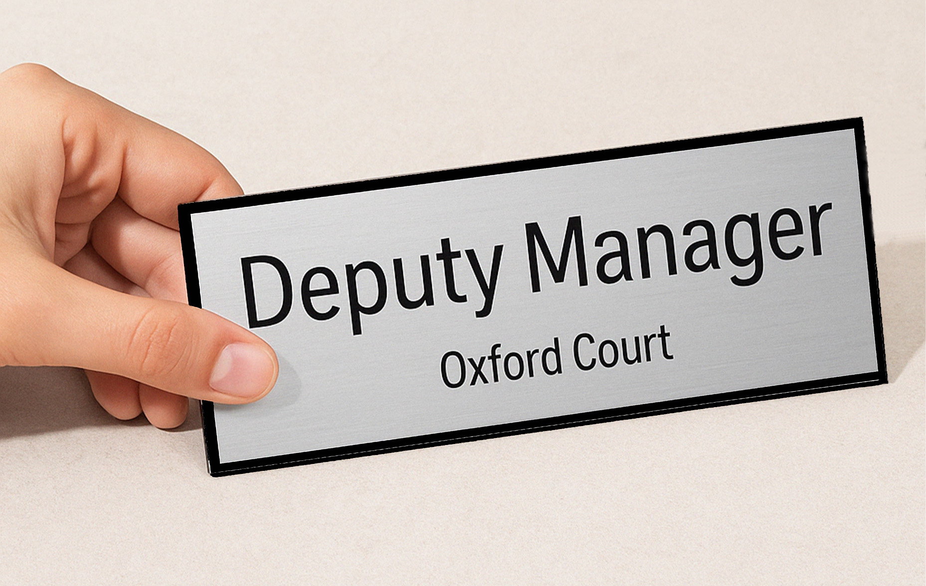 Personalised office sign from engraved plastic