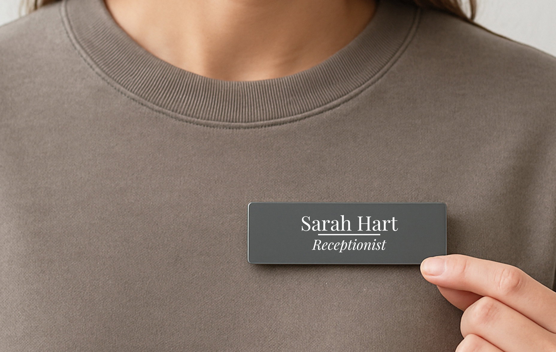 Personalised name badge in grey with name and title