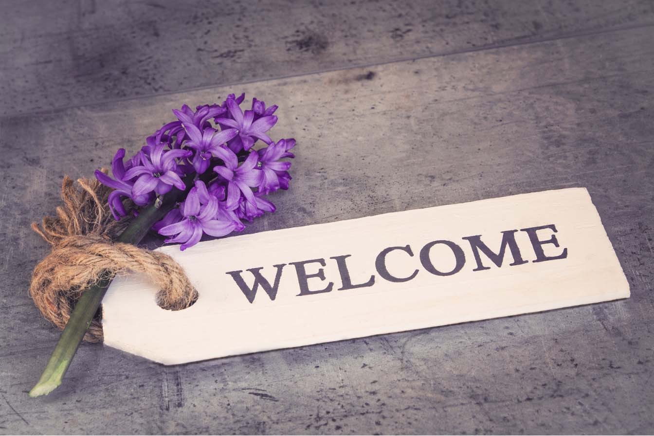 Innredningsskilt med teksten 'Welcome'