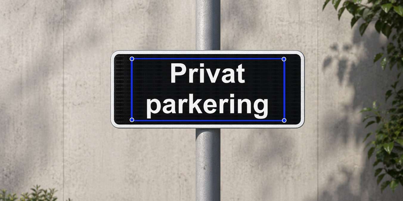 Svart parkeringsskilt med hvit tekst
